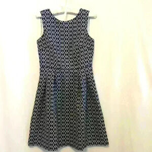 Philosophy sleeveless dress with front pleats and slightly flared skirt.  Size L